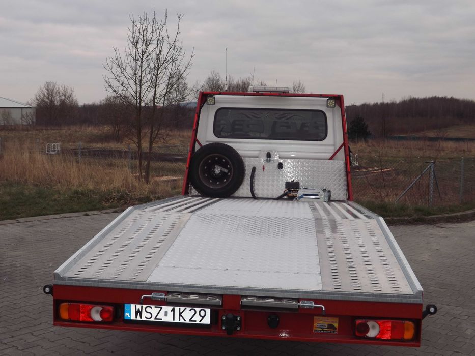 Autolaweta Polska Zagranica Laweta Pomoc Drogowa Holowanie 24H