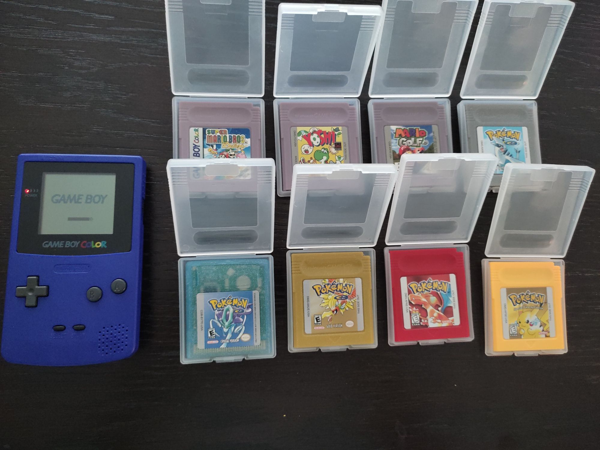 Conjunto Gameboy Color roxo com 8 jogos e cabo link
