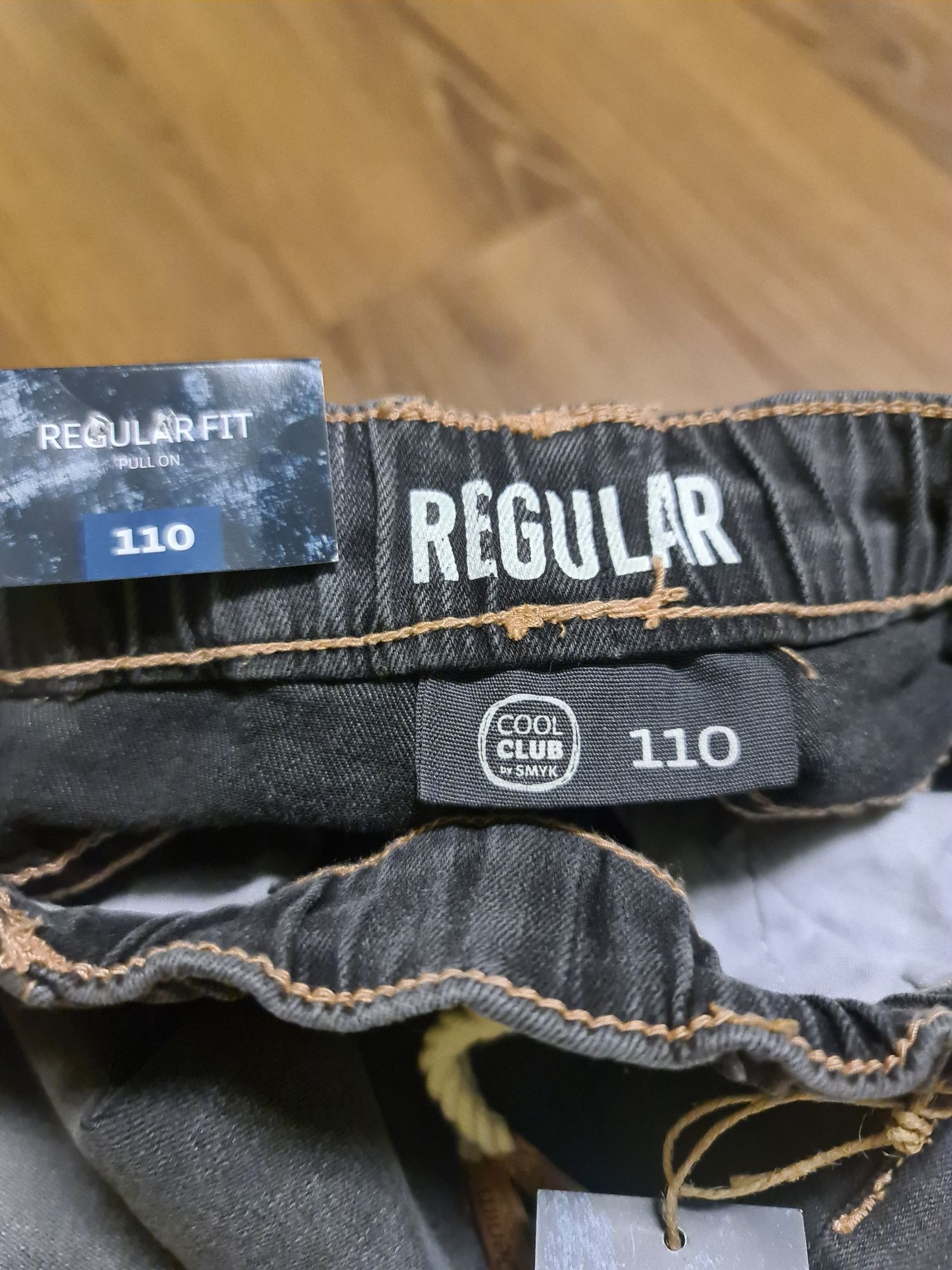Nowe spodnie jeansy 110 regular fit