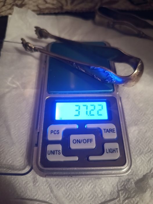 Антикварні срібні щипці для цукру