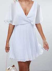 Asos mini dress with pleat skirt and flutter sleeve.