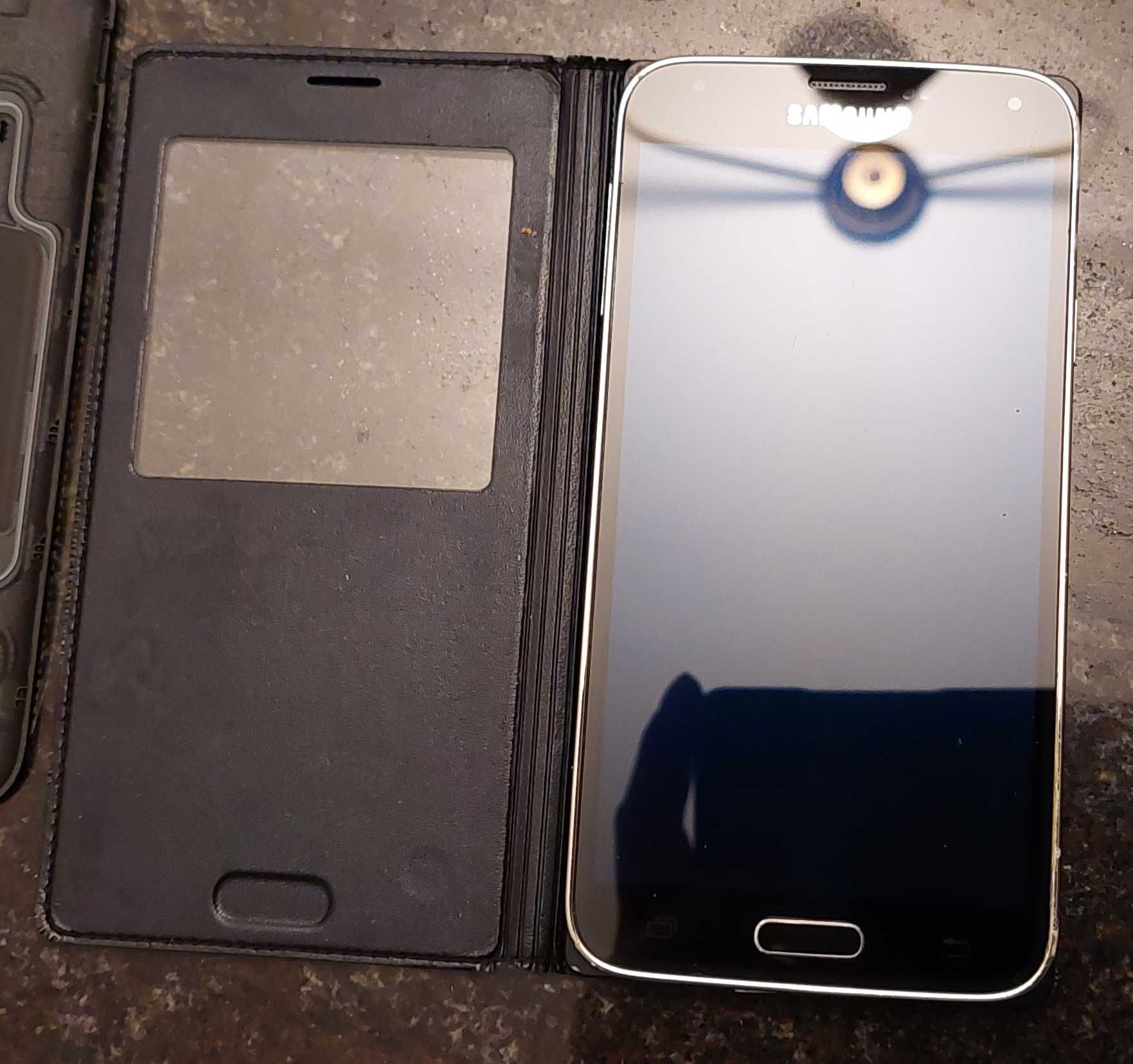 Samsung SM-900F, etui i podkładka do ład. bezprzedwodowego i inne
