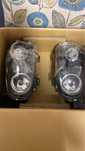 Faróis Angel Eyes LED Volkswagen Golf IV (4) Look R32, fundo preto