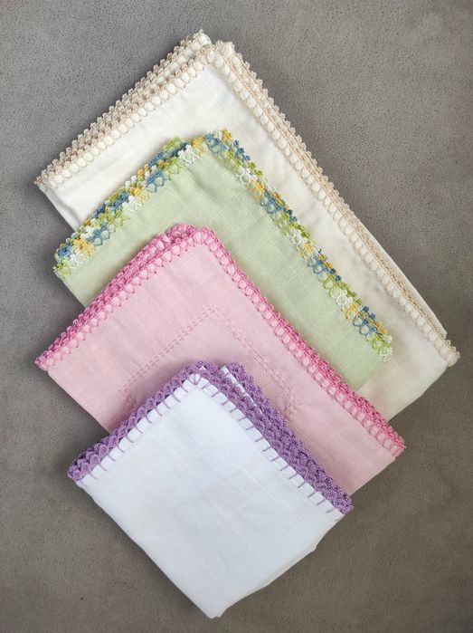 Fraldas para bebés bordadas a mão