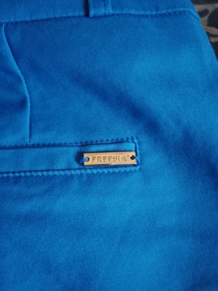 Eleganckie spodnie damskie błękitne S Freesia Paris