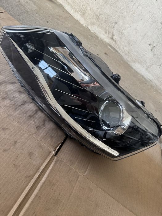 Nowa Lampa Lewa Skoda Rapid xenon 5JB941015C