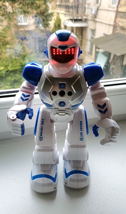 Игрушка  Робот  Интерактивный с пультом говорит и танцует