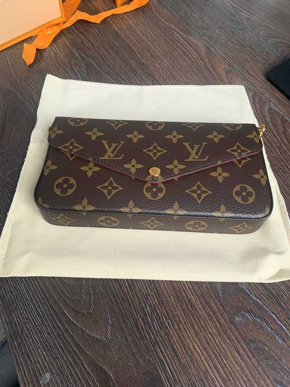 Клатч Louis Vuitton б/у