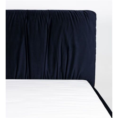 Łóżko tapicerowane ze stelażem granat czarne nogi