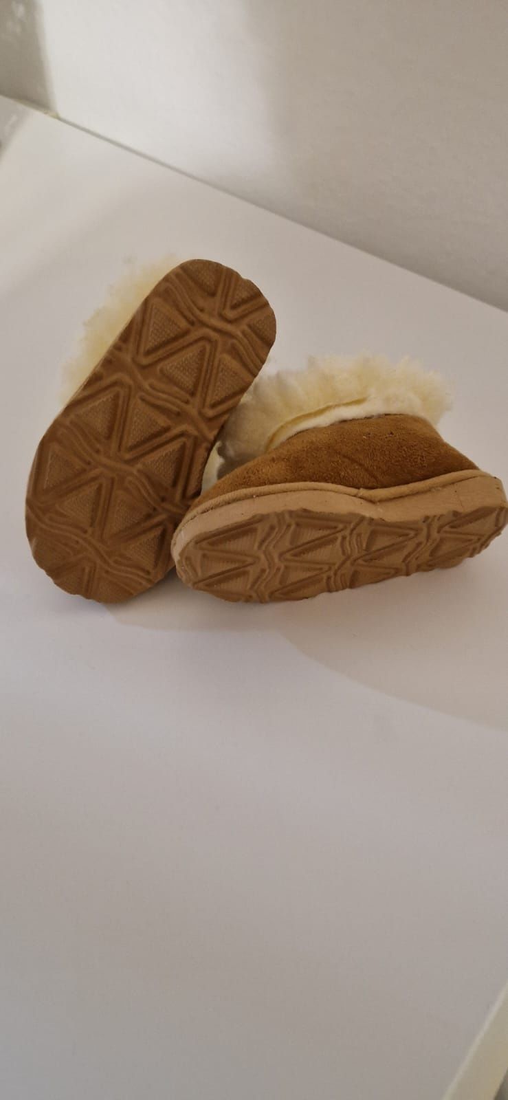 Pantufas com pelo bebé