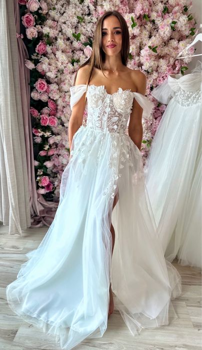 Nowiutka sukienka ślubna