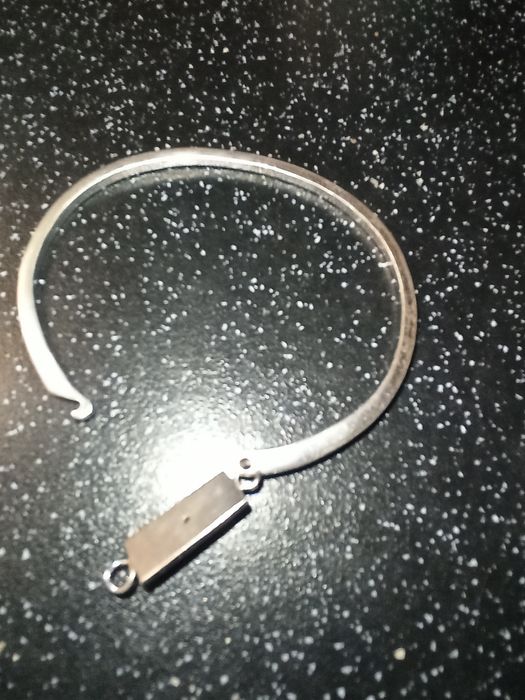 Серебряный браслет .