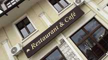 Szyld reklamowy restaurant and cafe brązowy