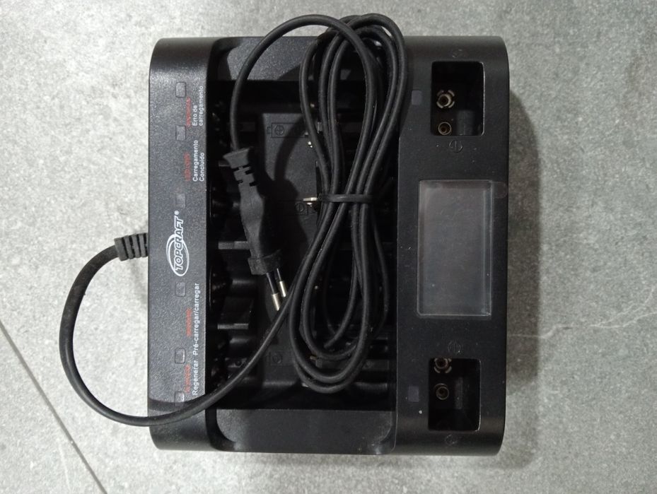 0: Carregador de pilhas (como novo)