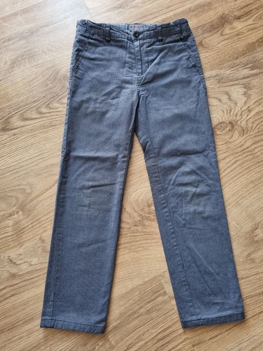 Spodnie eleganckie coccodrillo 128 plus płaszcz 36