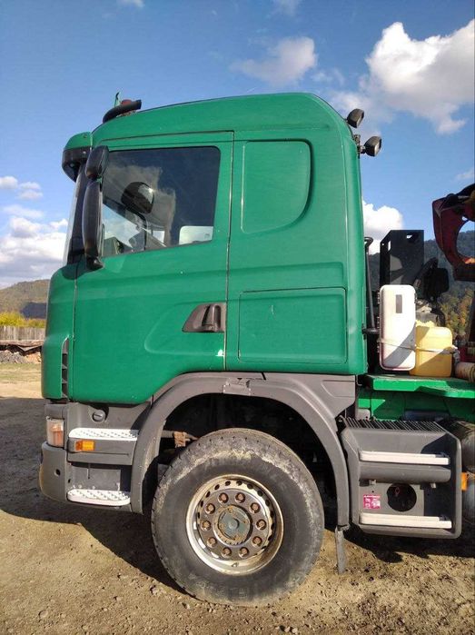 Scania лісовоз з 6х6 маніпулятором