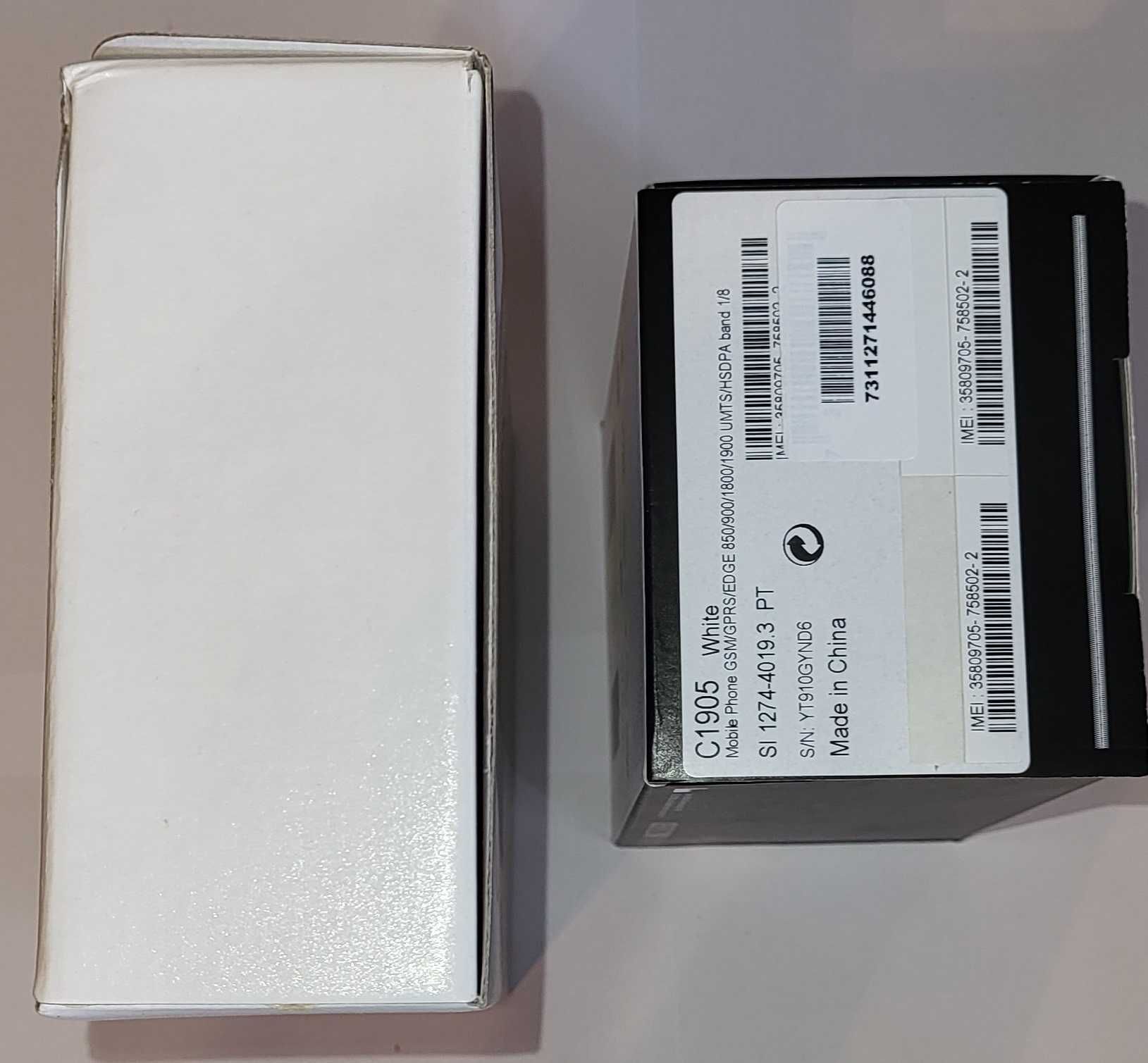 Conjunto caixas para telemóveis com manuais incluidos