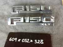 FORD F150 F-150 XLT ZNACZEK EMBLEMAT PRZEDNI NA BŁOTNIK ORGINAŁ