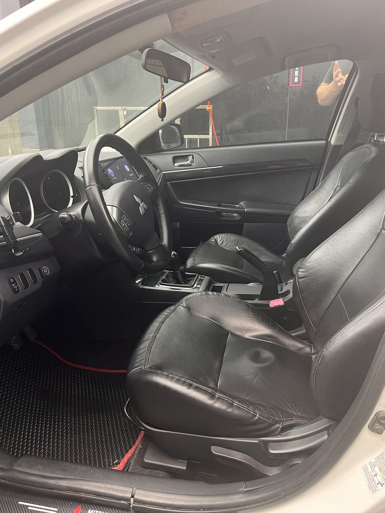 Mitsubishi Lancer 2012 • 1.6 МКПП ГАЗ/БЕНЗИН