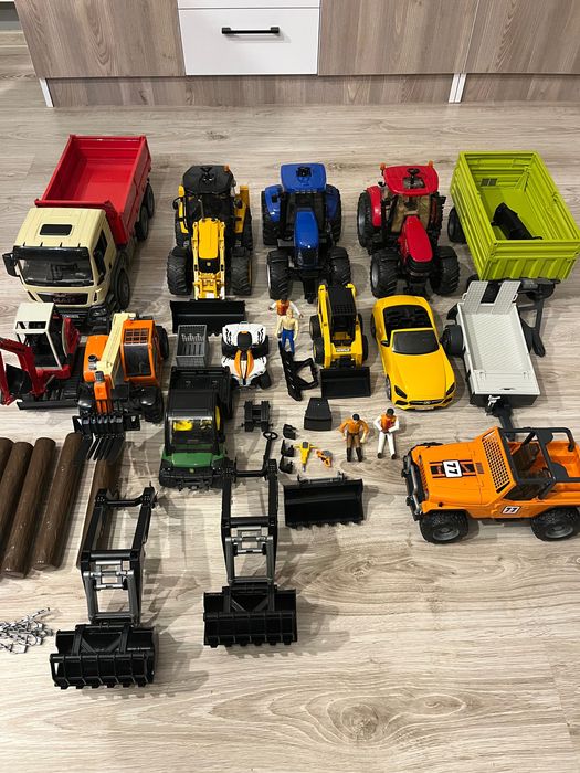 Duży zestaw bruder + akcesoria Man, New Holland, przyczepy