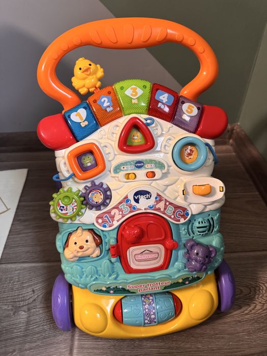 Дитяча каталка ходунки з ігровою панеллю