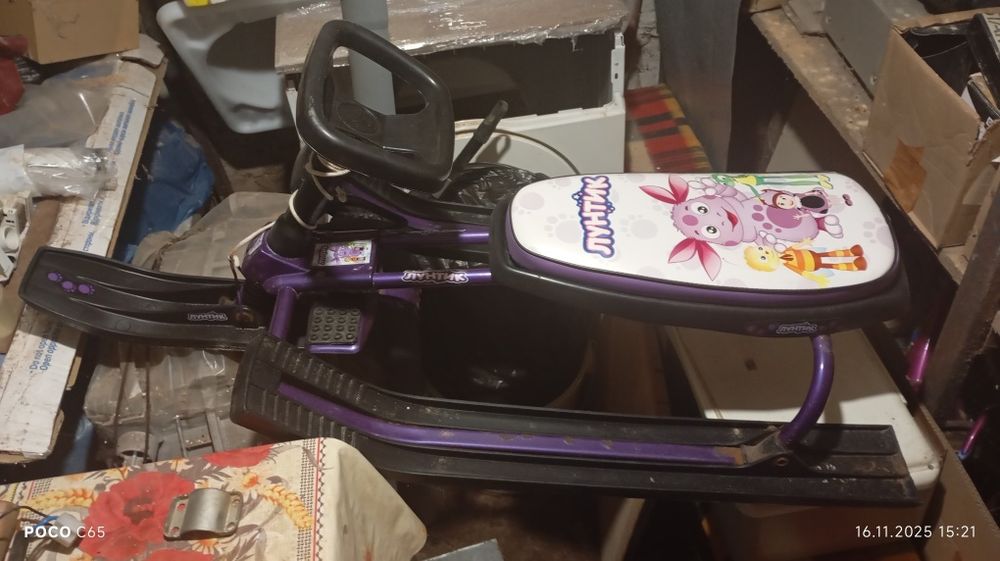 Санки з рулем снігокат