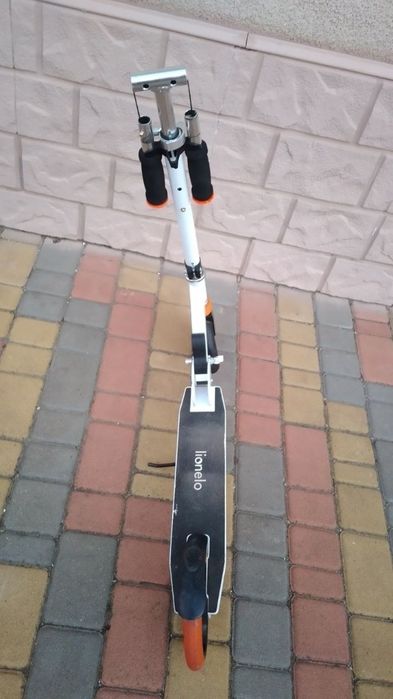 Самокат Lionelo Luca біло-помаранчевий