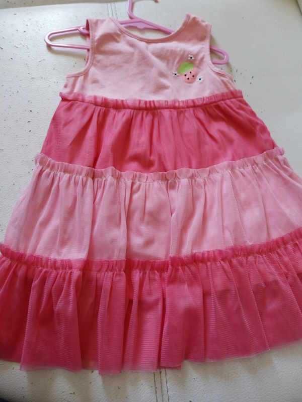 Pack de roupas em tons de rosa e branco da marca Tuc Tuc