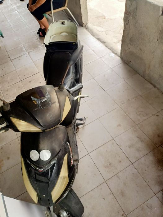 Vendo mota elétrica bateria boas faz 25km a 30km funcionar bem .