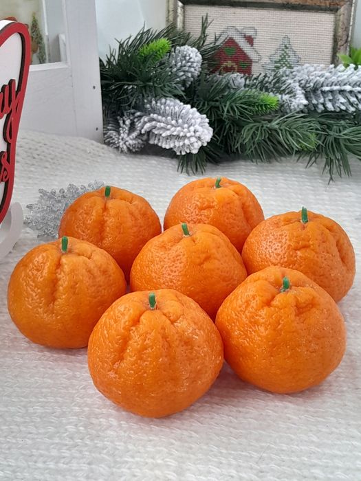Свічка мандаринка.