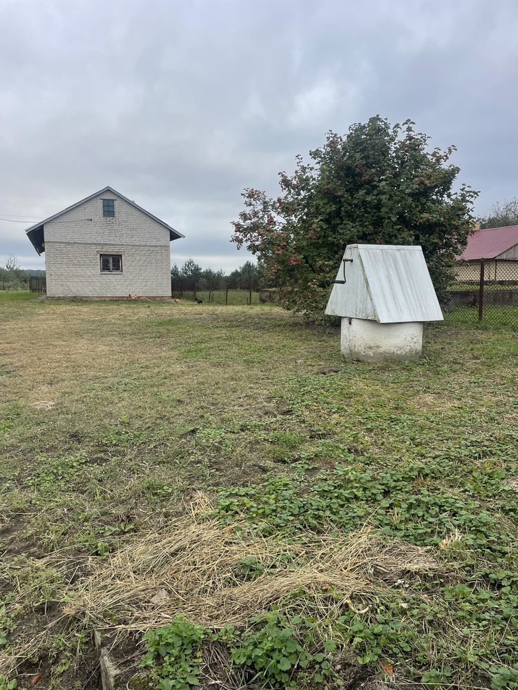 Будинок ,земельна ділянка під забудову