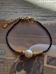 Pulseira em aço e missangas NOVA