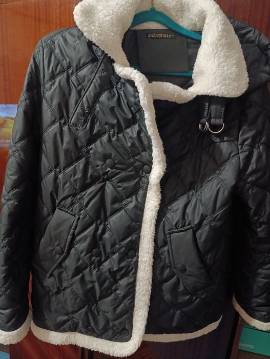 Курточка  новая.