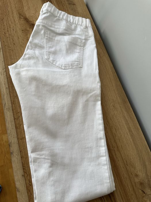 Białe spodnie z bawełny typu jeggins