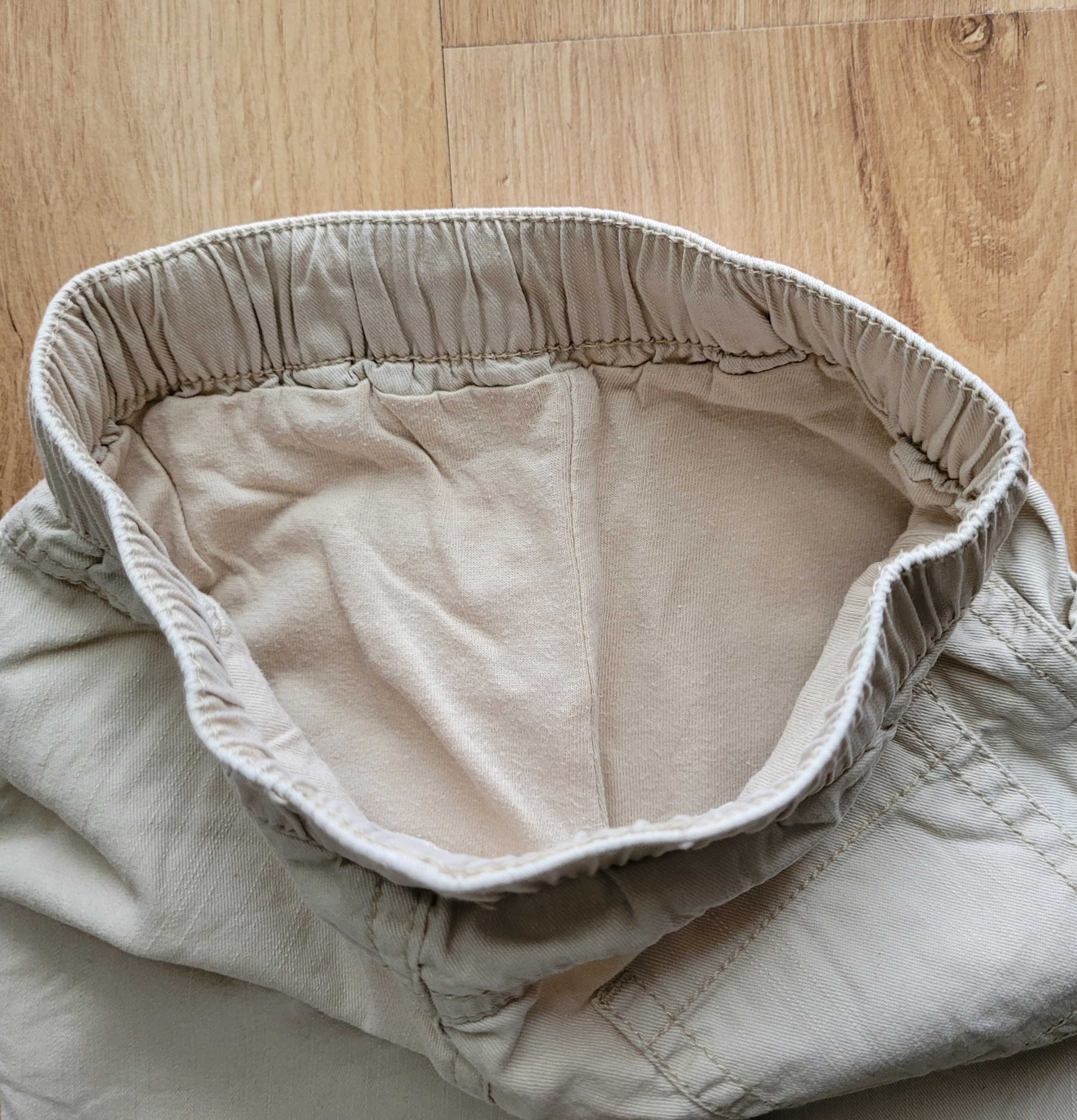 Bawełniane spodnie 68 3-6 długie niemowlęce unisex + śliniak Next