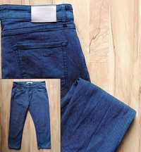 Lacoste. Spodnie jeansowe męskie (W36 L34)