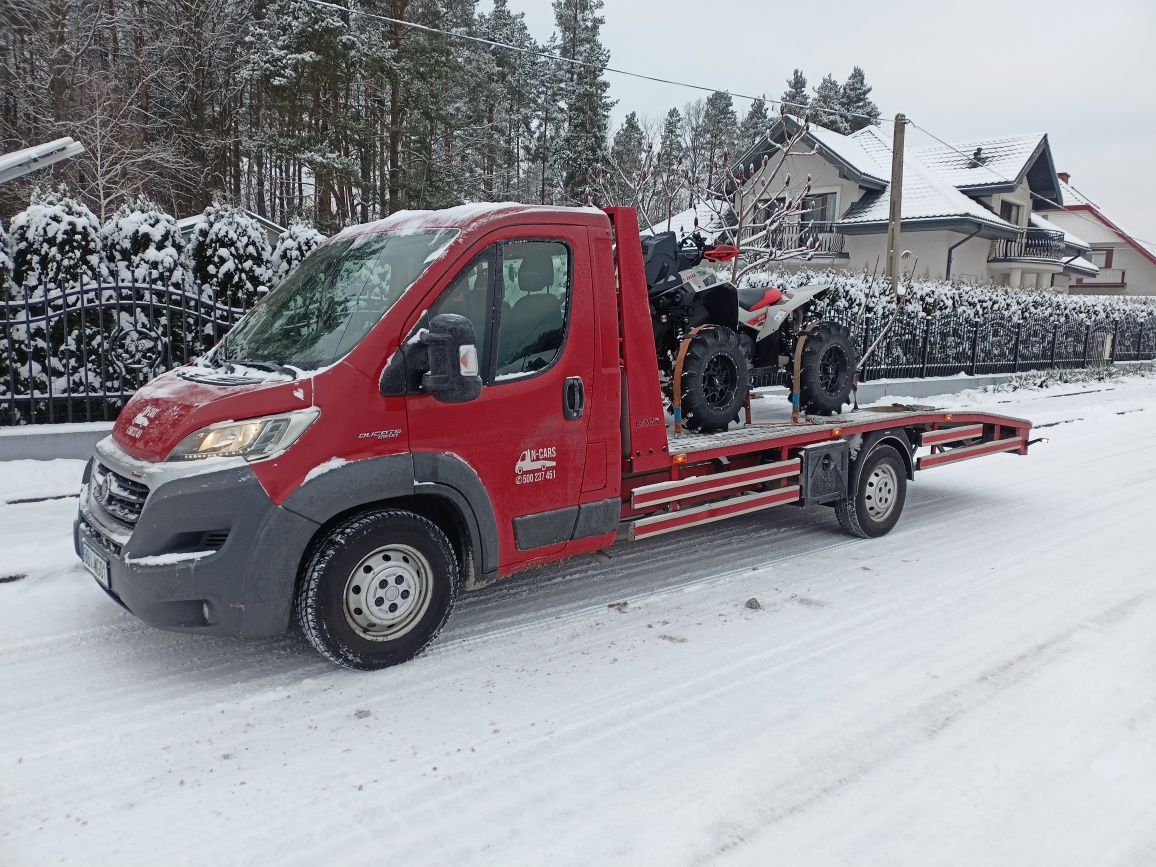 Usługi transportowe lawetą Transport maszyn transport bus PomocDrogowa