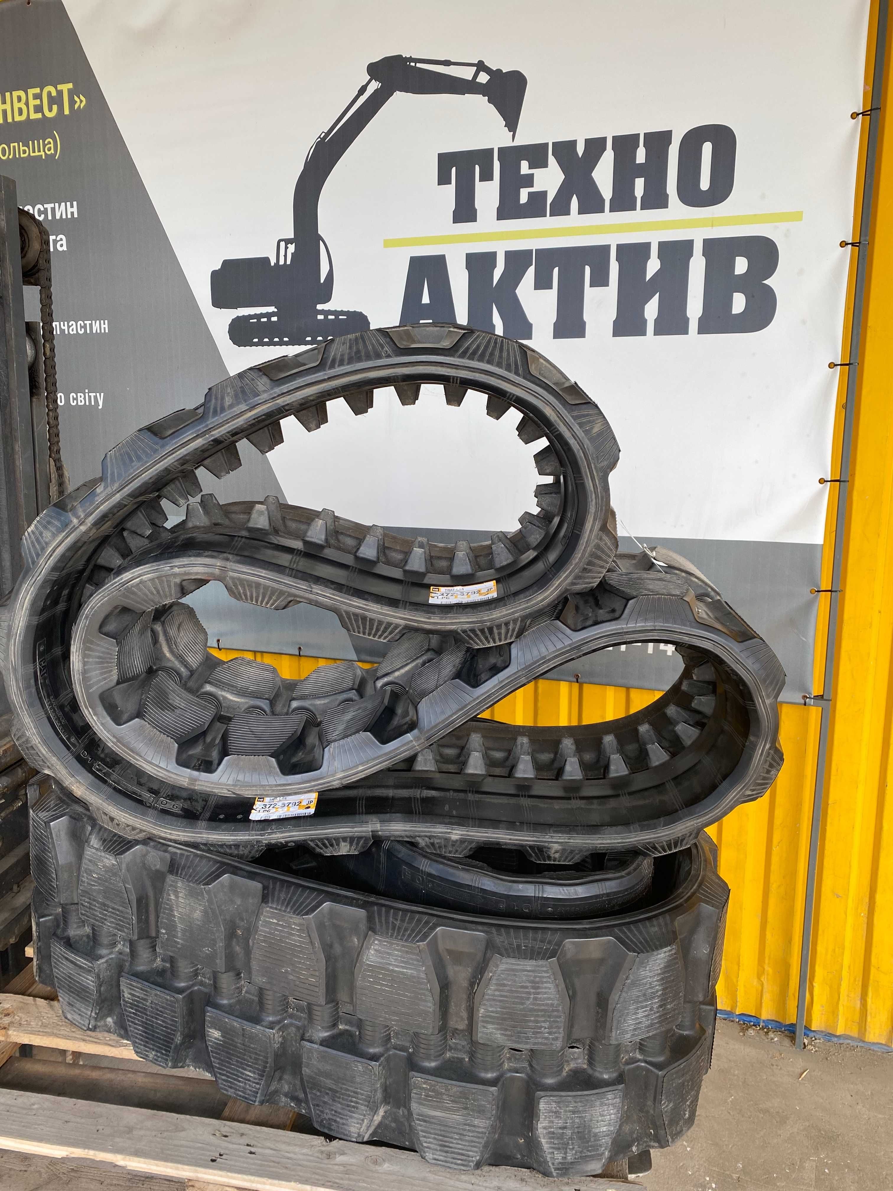 Резинова гусениця 400X86X56 резиновая гусеница оригінал CAT