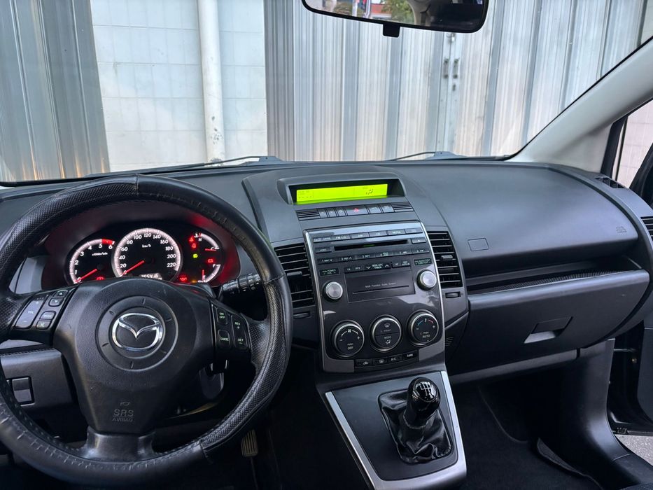 Mazda 5 7 lugares aceito troca por carro