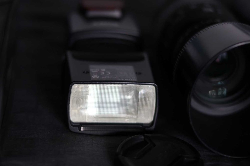 Zestaw 2x obiektywy sigma + lampa do sony typ A