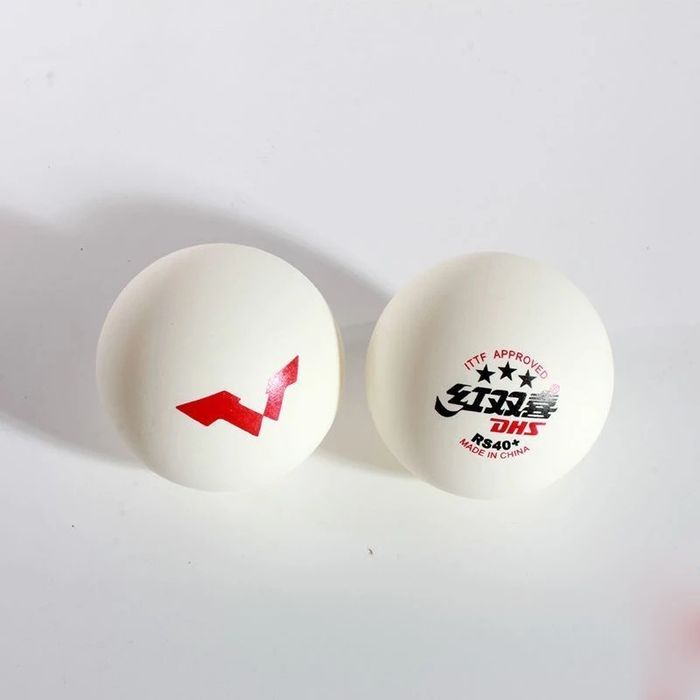 Турнірні м'ячі DHS RS 40+ WTT для настільного тенісу (мячики, шарики)