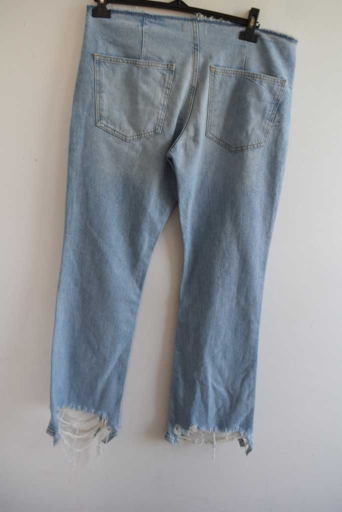Bershka spodnie jeansy dziury dzwony 40 l xl