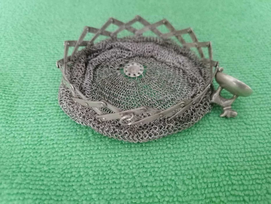 Porta moedas de prata.