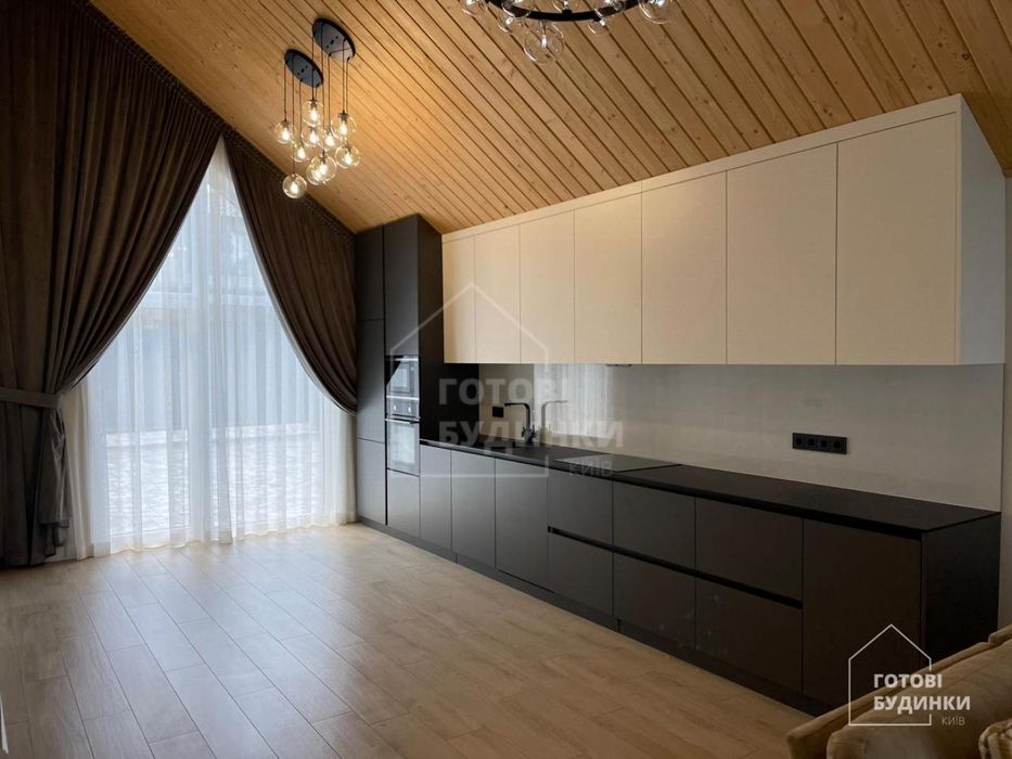 Сучасний будинок серед соснового лісу в КМ Нова Ходосівка