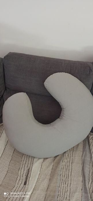 Almofada de amamentação como nova