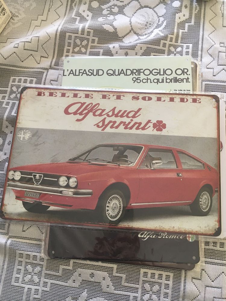 Varias placas alfa Romeo ainda com plastico