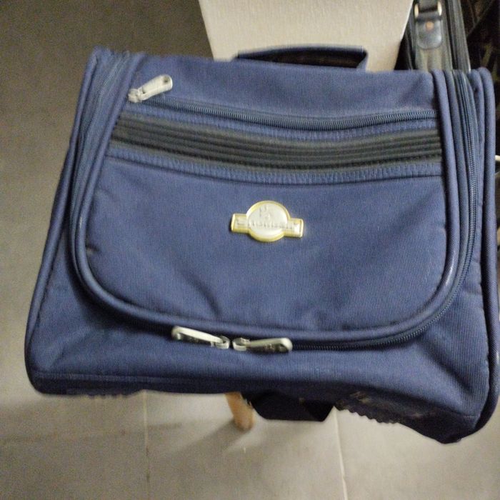Mala azul apoio viagem