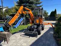 Boki-45 50  Koparka obrotowa kołowa 4x4 BOKI 45 50 cmentarna