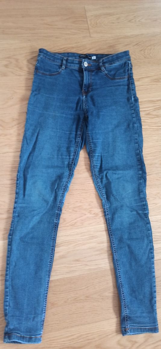 Damskie jeansowe spodnie model skinny  mid waist w rozmiarze 38/M