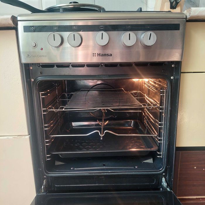 Продам комбинированную газовую печь Hansa с полным газ.контролем.